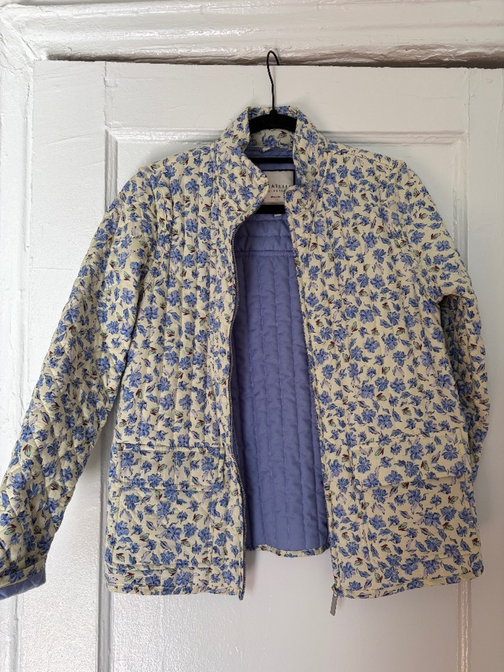 Beautiful, white quilted jacket with violet flowers from Bagatelle Collection
